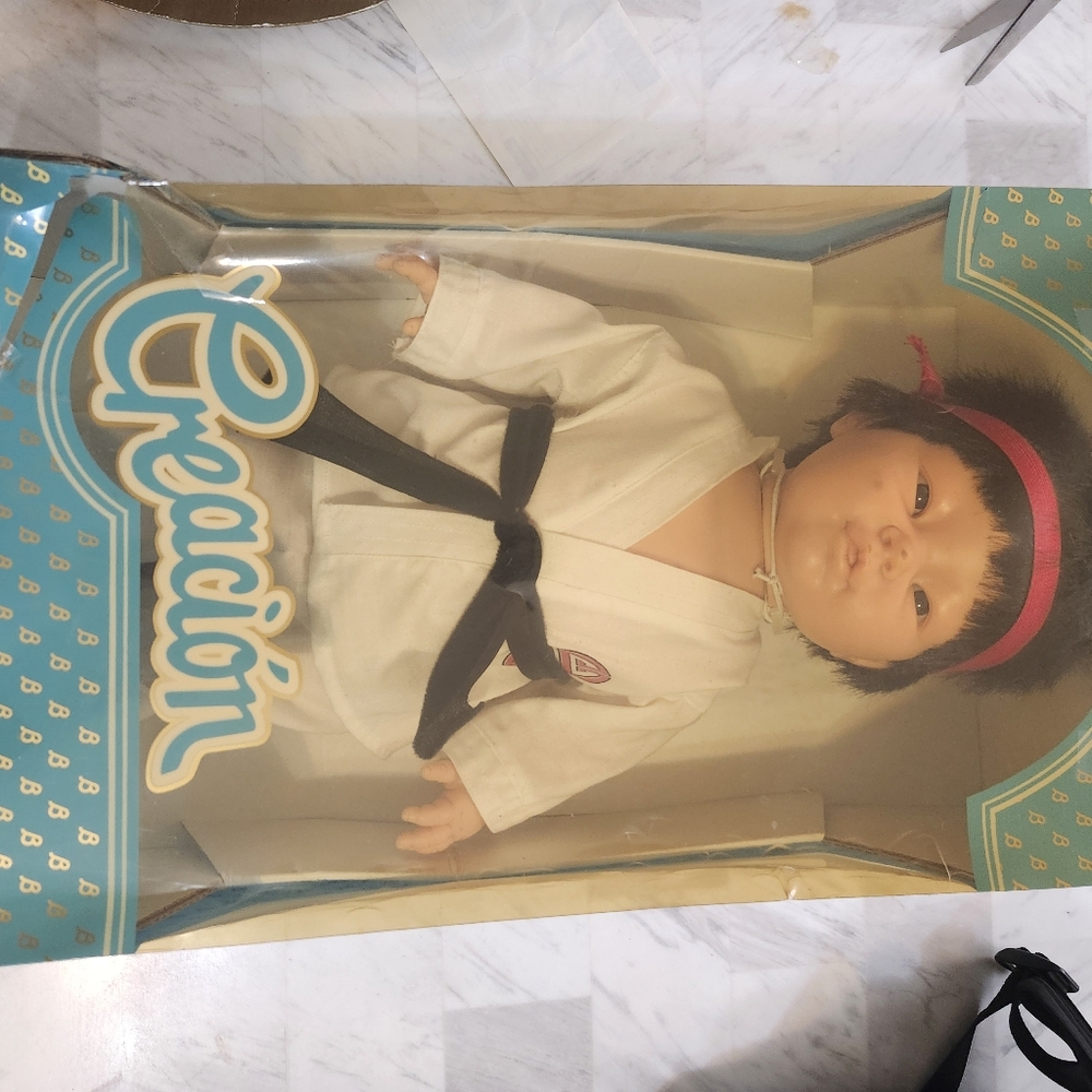Creación Doll with Black Belt and Pink Headband